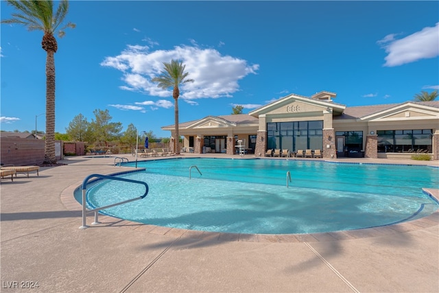 view of swimming pool with a patio area