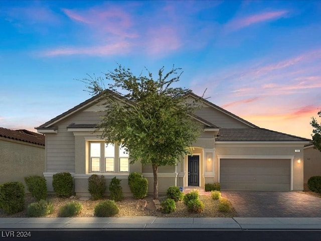 view of front of property featuring a garage