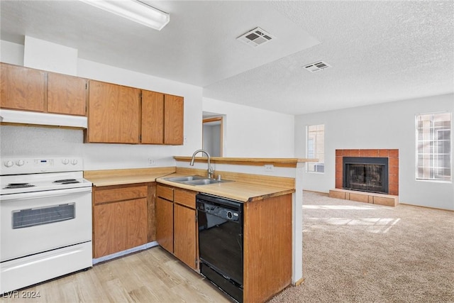 kitchen featuring black dishwasher, white electric stove, open floor plan, a sink, and under cabinet range hood