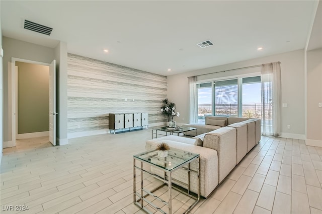 living room featuring tile walls