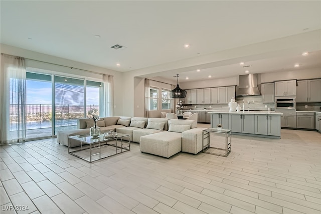 living room with light hardwood / wood-style flooring