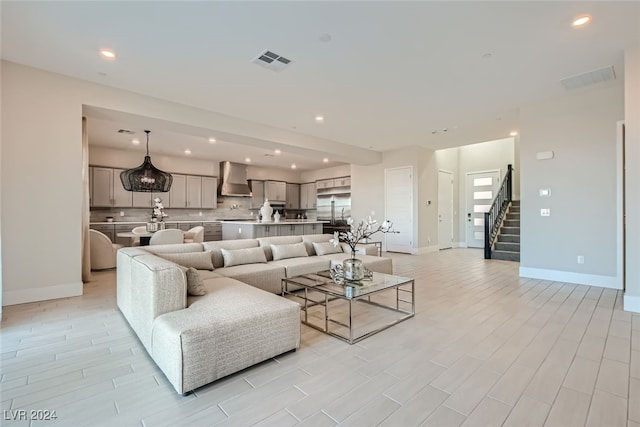 living room with light hardwood / wood-style flooring