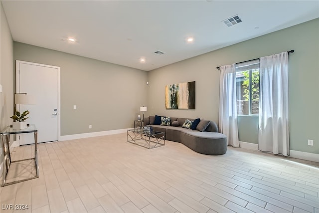 living room featuring light wood-type flooring