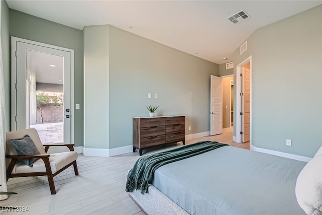 bedroom featuring light hardwood / wood-style floors