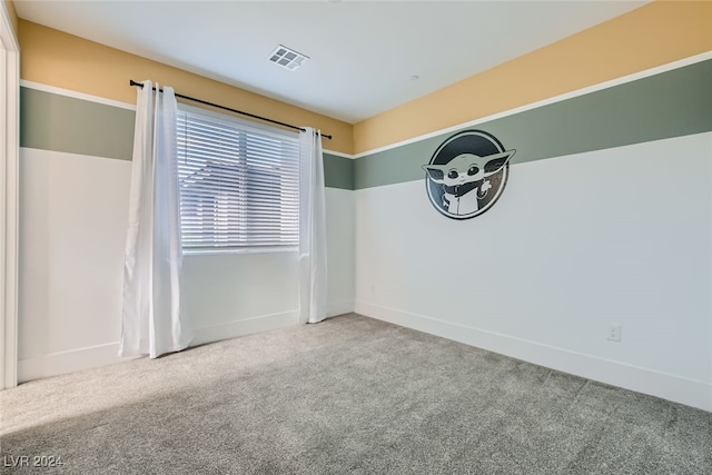 unfurnished room with carpet