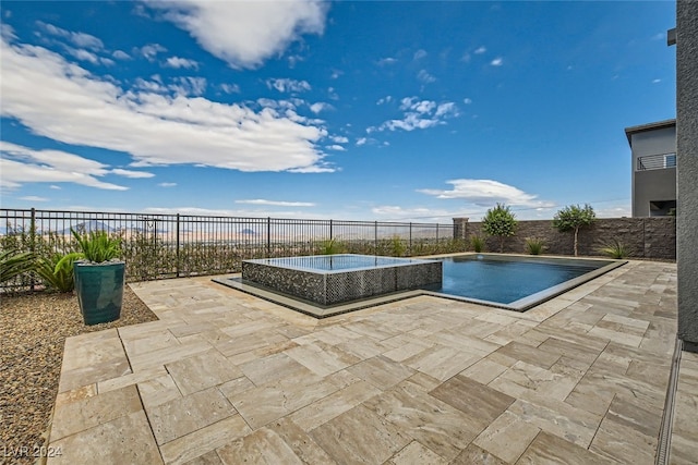 view of pool with a patio