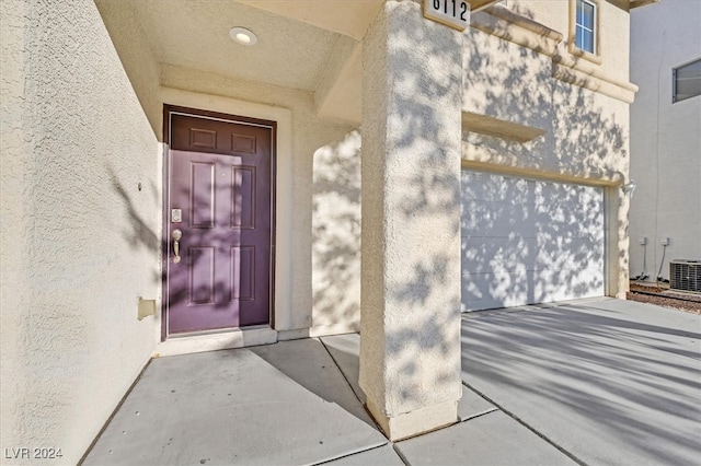 property entrance with central air condition unit