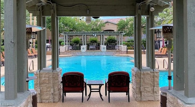 pool with a patio area