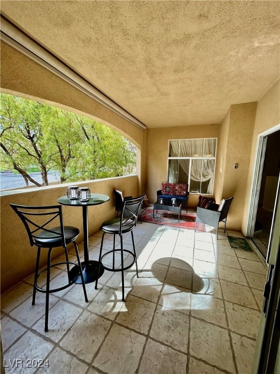 balcony featuring a patio area