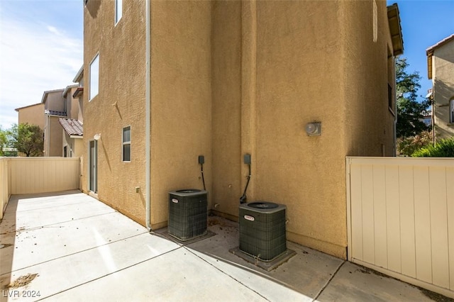 view of home's exterior featuring a patio and central AC unit