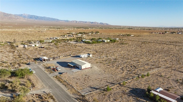 drone / aerial view featuring a mountain view