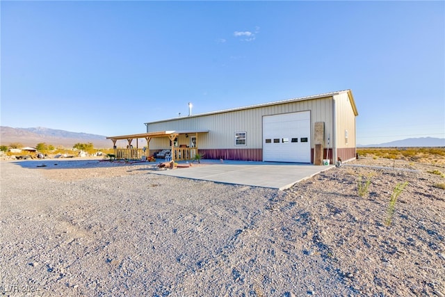 exterior space featuring a mountain view