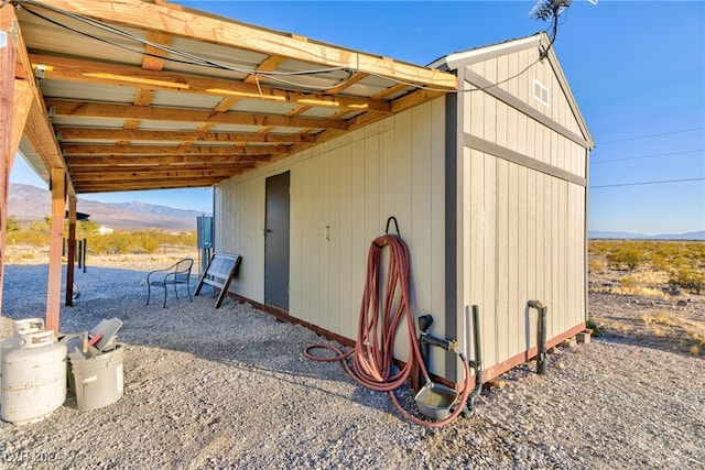 view of outdoor structure featuring a mountain view