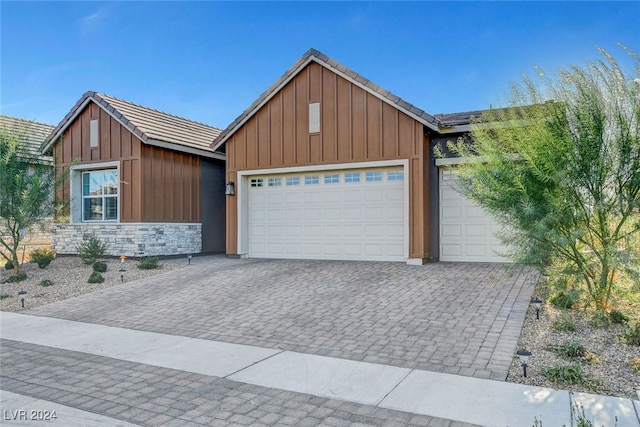 view of front of home with a garage