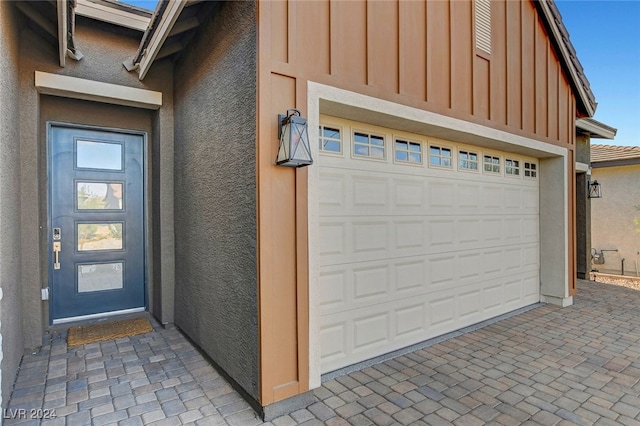 entrance to property with a garage