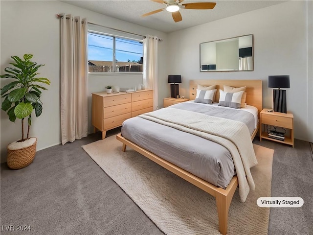 carpeted bedroom with ceiling fan