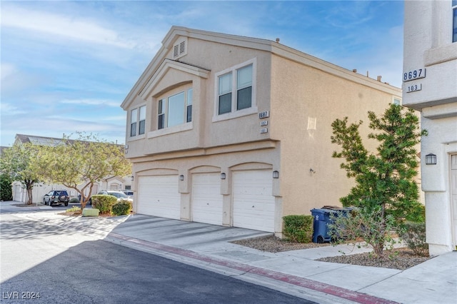 view of home's exterior with a garage