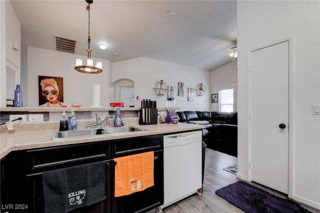 kitchen with dishwasher, sink, decorative light fixtures, light wood-type flooring, and ceiling fan with notable chandelier