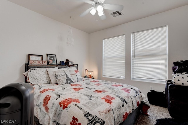 carpeted bedroom featuring ceiling fan