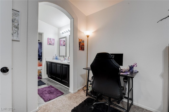 office area with light colored carpet