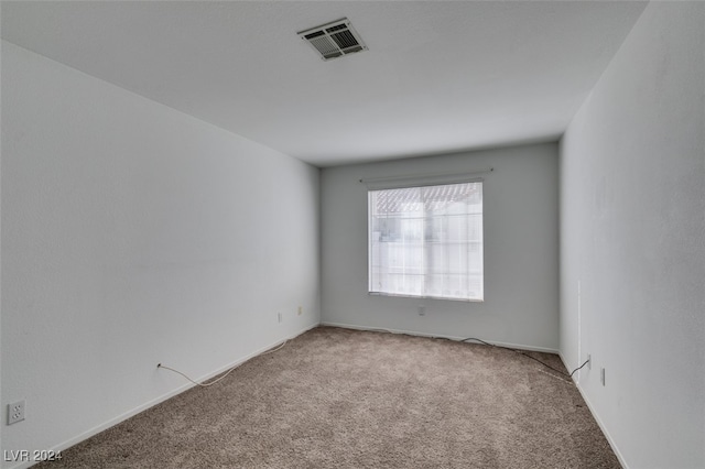 empty room featuring carpet