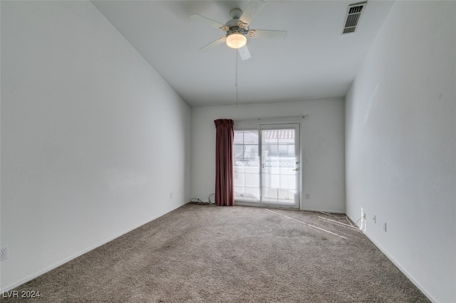 carpeted empty room with ceiling fan