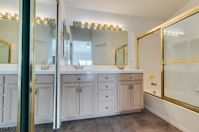 bathroom featuring vanity and enclosed tub / shower combo