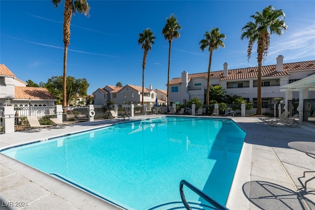 view of swimming pool with a patio area