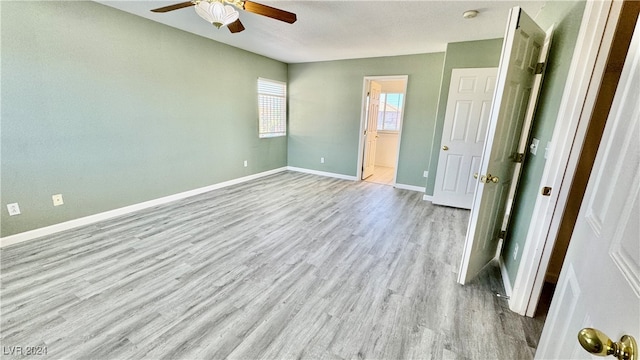 interior space featuring light hardwood / wood-style flooring and ceiling fan