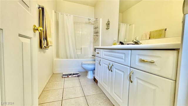 full bathroom with vanity, toilet, shower / bath combo with shower curtain, and tile patterned flooring