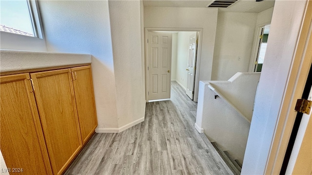 interior space with hardwood / wood-style floors