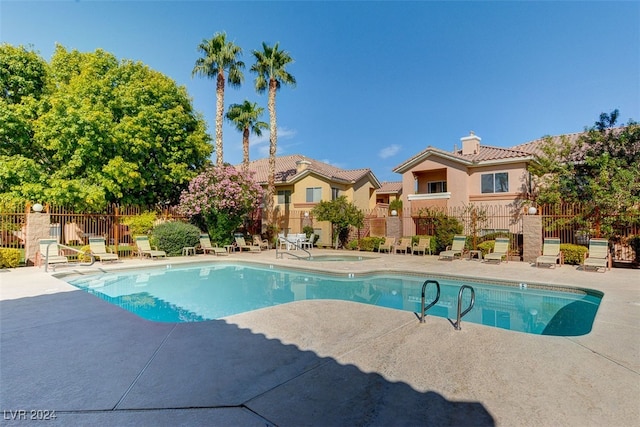 view of pool featuring a patio area