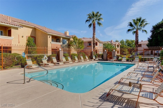 view of swimming pool with a patio area