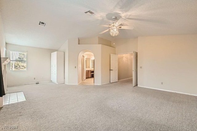 spare room featuring a textured ceiling and ceiling fan