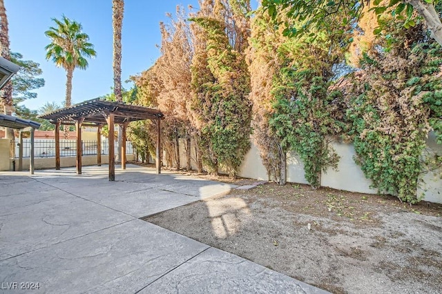 view of patio featuring a pergola