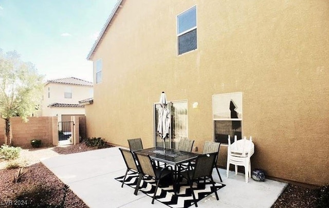 back of house featuring a patio area