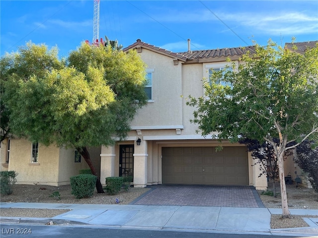 view of front of home featuring a garage