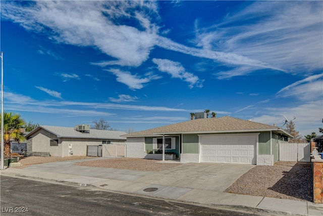 single story home with a garage