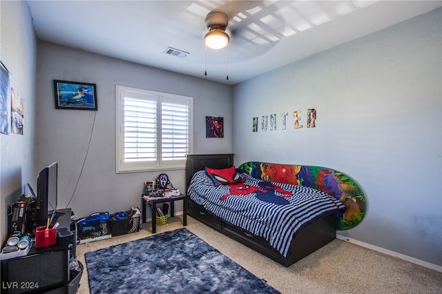 carpeted bedroom with ceiling fan