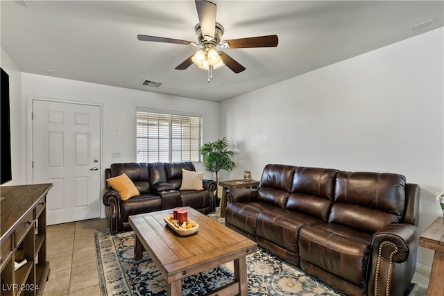 living room with light tile patterned floors and ceiling fan