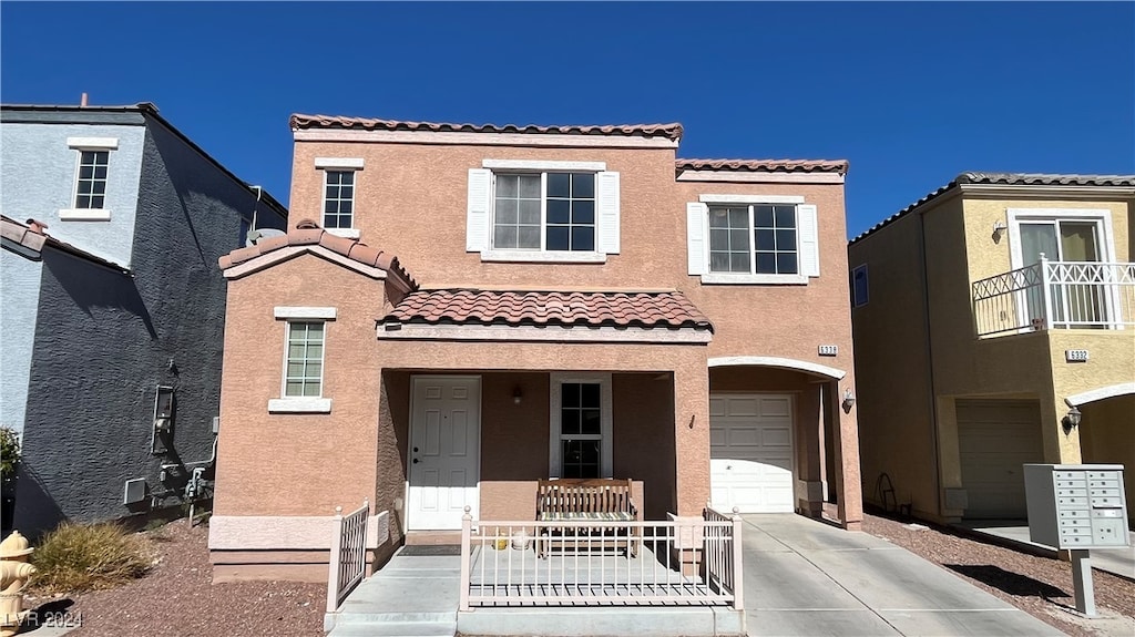 view of front of property featuring a garage