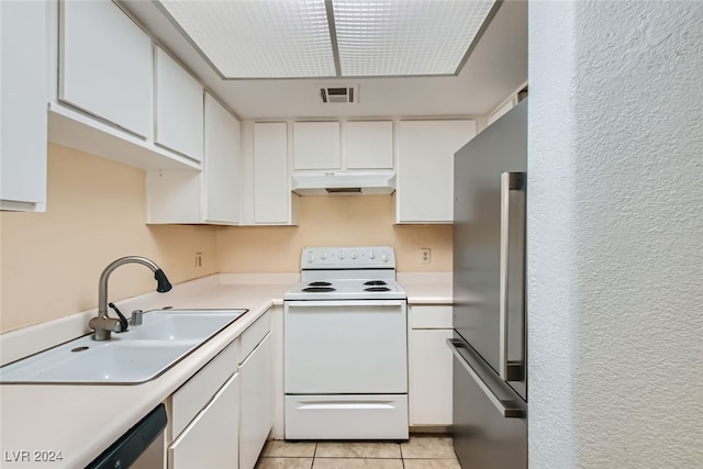 kitchen featuring white cabinetry, appliances with stainless steel finishes, sink, and light tile patterned floors