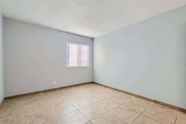 view of tiled spare room