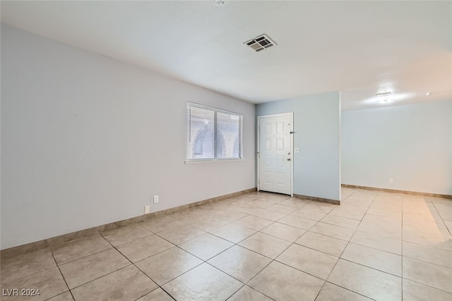 empty room featuring light tile patterned flooring