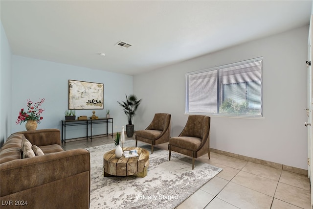 sitting room with light tile patterned flooring