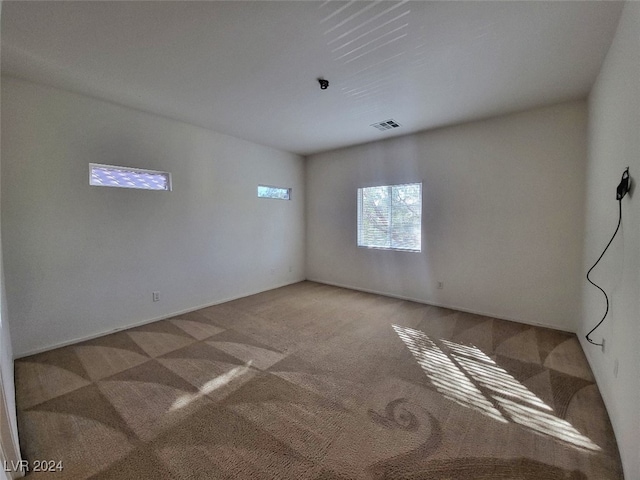 view of carpeted spare room