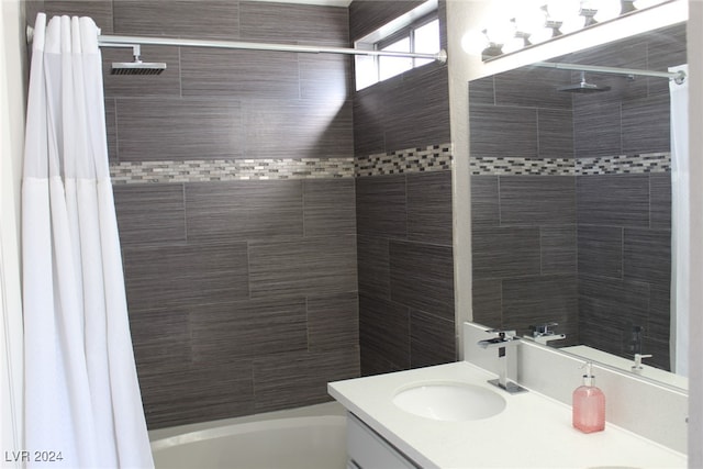 bathroom with vanity and shower / tub combo with curtain