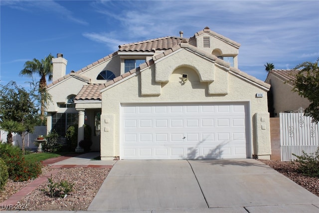 view of front of home with a garage