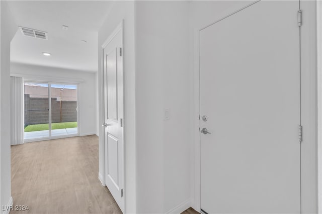 hall featuring light wood-type flooring