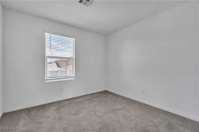 empty room featuring carpet flooring